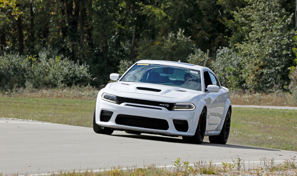 image of white car in Evaluation and Hadling Road