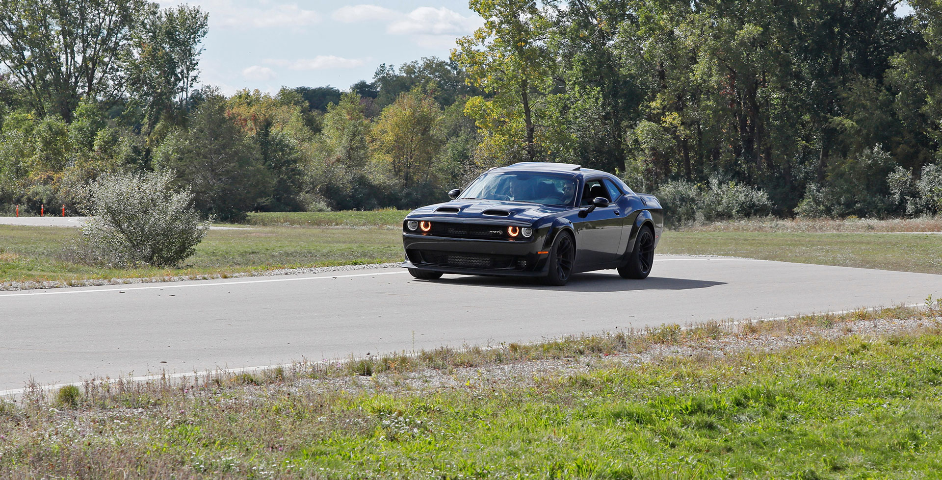 image of black car in Evaluation and Hadling Road 5