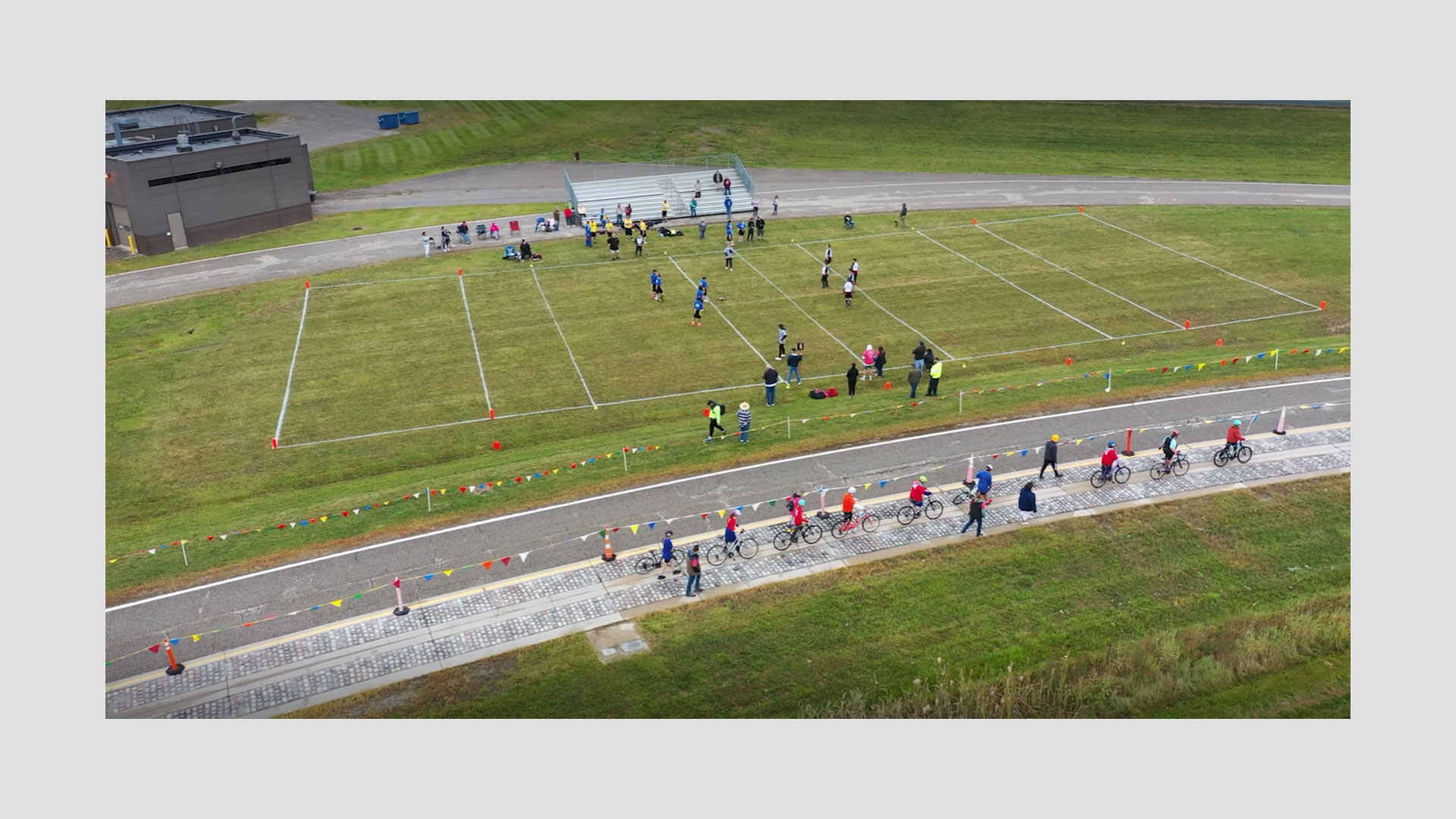 Image from the top of guys playing rugby and cycling